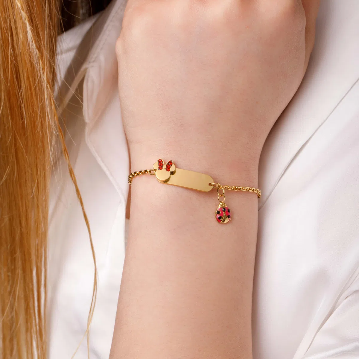 Disney Bracciale Lucky Minnie Collezione Acciaio, Colore Oro, con Coccinella Rossa, Gioielli Bambine e Bambini, 18cm