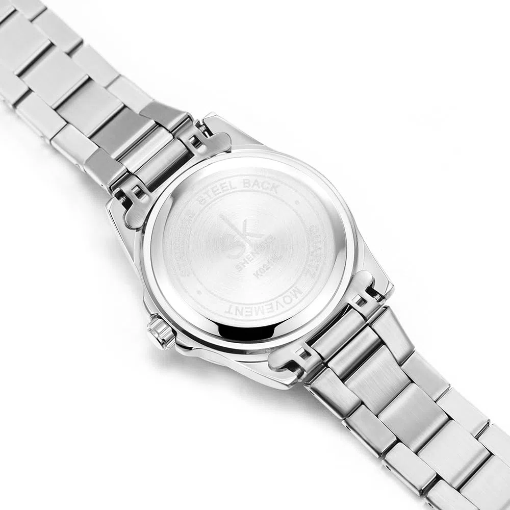 SHENGKE Orologi al quarzo minimalisti da donna con data bracciale in acciaio inossidabile e quadrante colorato alla moda