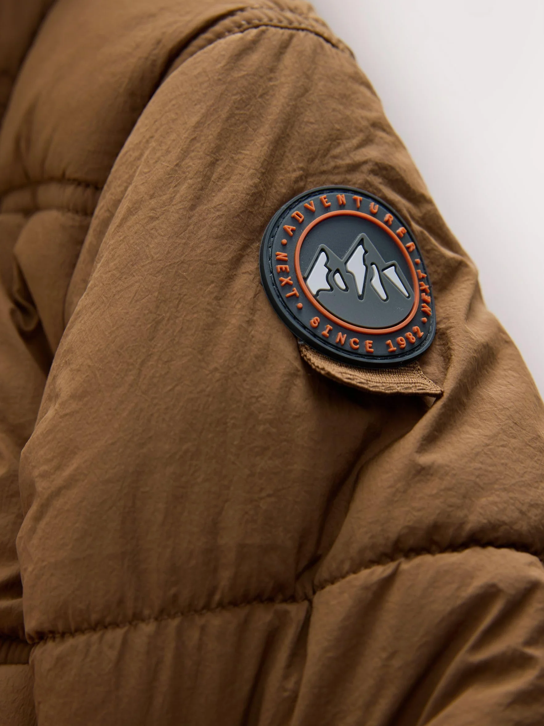 NEXT Ragazzo Cappotto imbottito impermeabile con fodera in sherpa